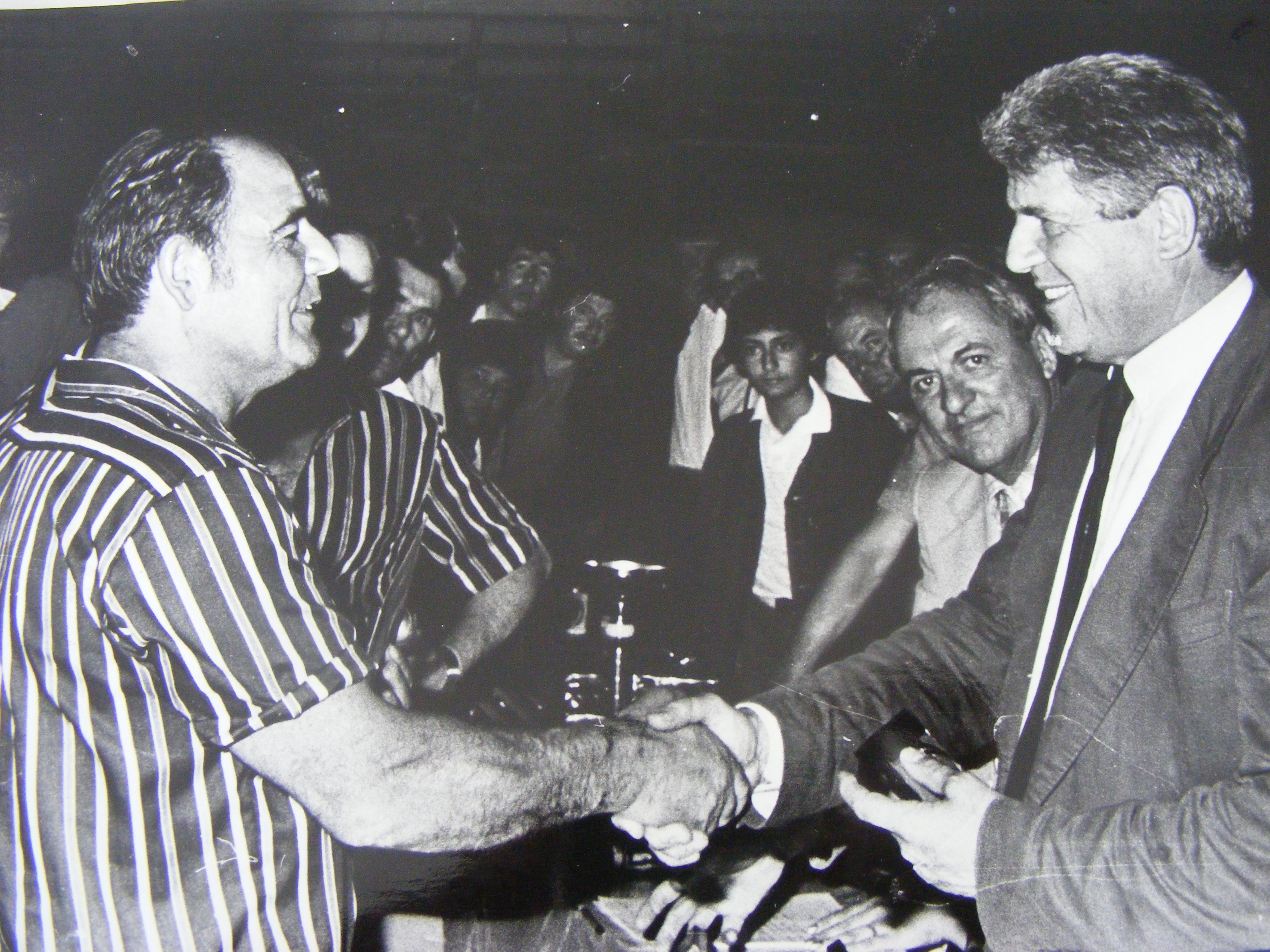 "Le tonnelier et le grand couturier..." Emile Meissonnier félicité par Jean Bousquet "Cacharel" le Maire de Nîmes àprès la victoire de Midi Libre 1983 "Le tonnelier et le grand couturier..." Emile Meissonnier félicité par Jean Bousquet "Cacharel" le Maire de Nîmes àprès la victoire de Midi Libre 1983